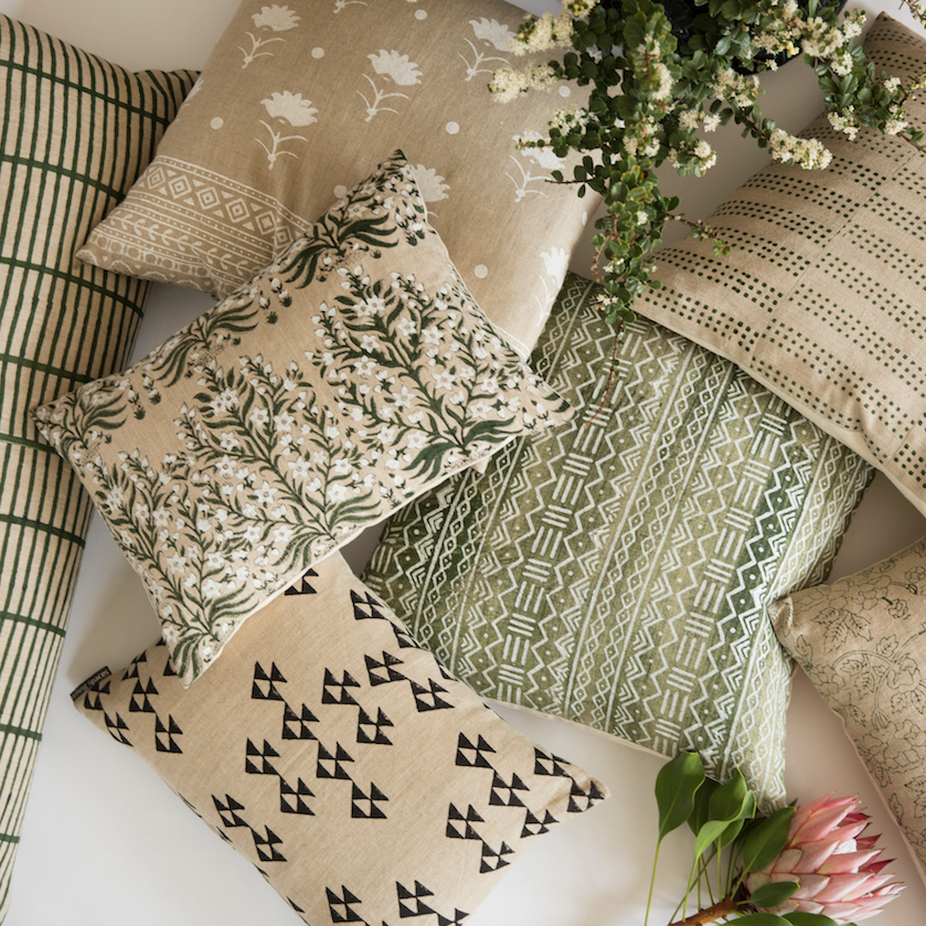 Stack of block printed pillows from India