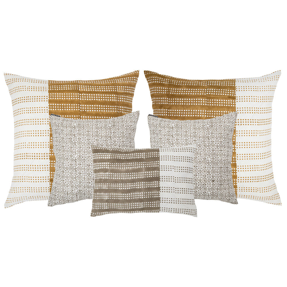 arrange throw pillows